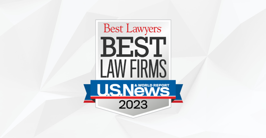 light-colored shattered-looking background with the "Best Lawyers Best Law Firms 2023" badge overlayed